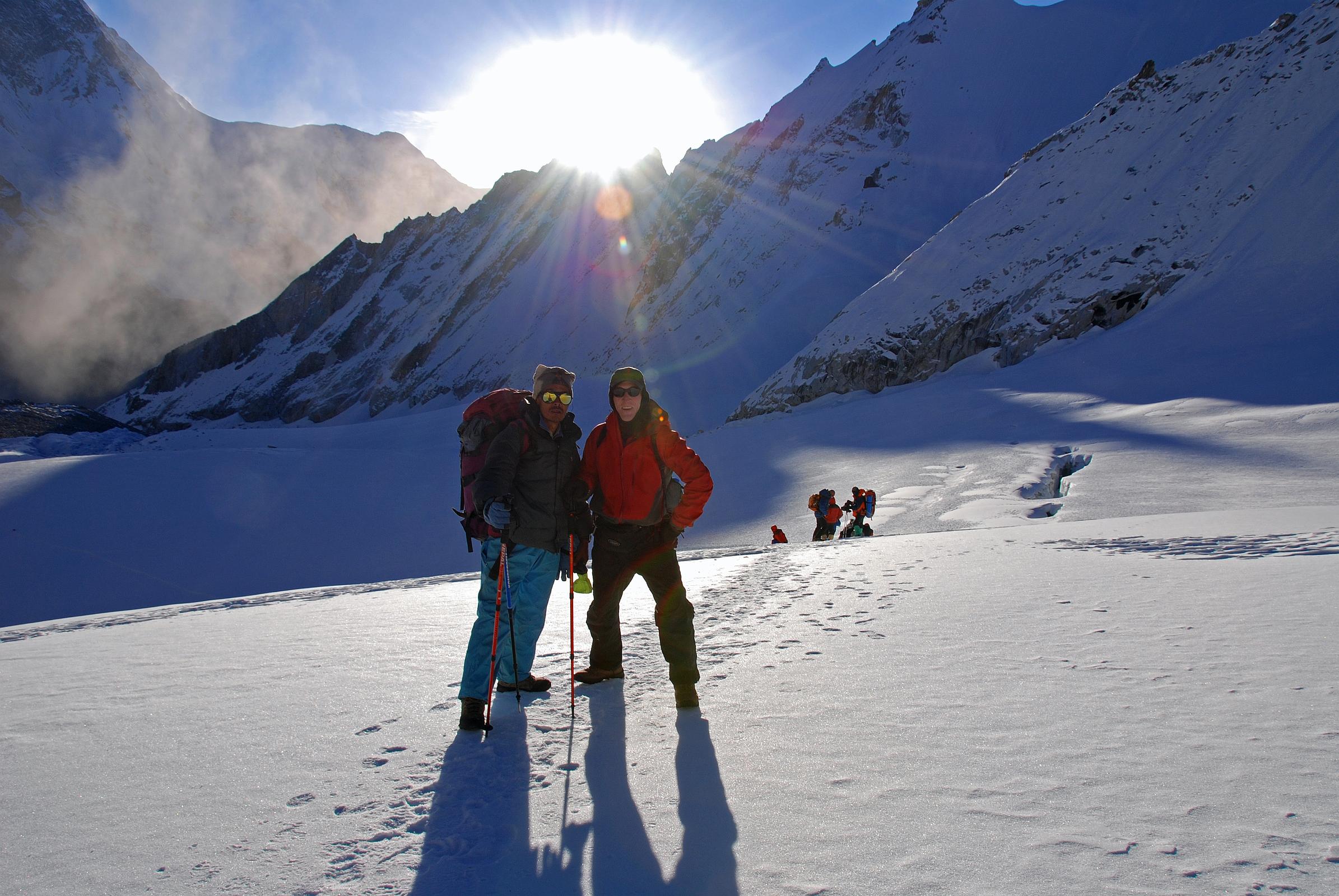 10 1 First Rays Of Morning Sun Hit Climbing Sherpa Palde and Jerome Ryan Trekking On Glacier Towards East Col